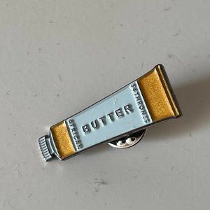 54 THRONES African Beauty Butter Lapel Pin